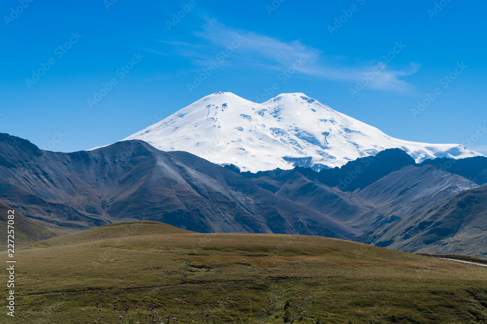 Beautifull landscape view of the mount Elbrus - the highest mountain in Europe. Caucasus mountains at autumn season time.