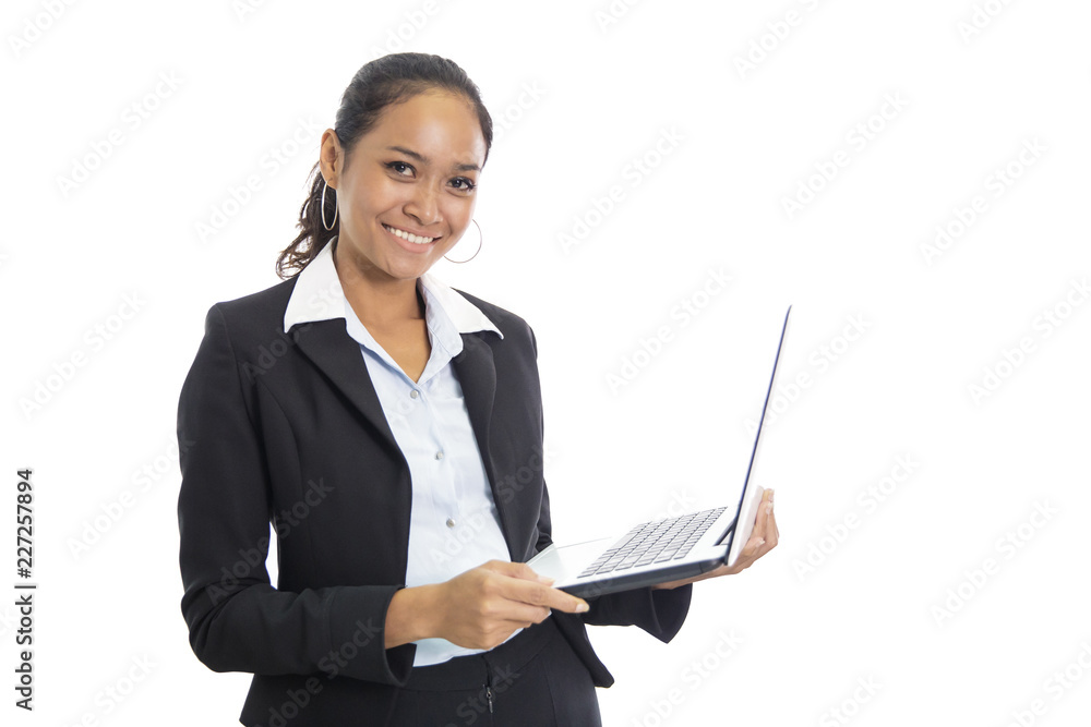 young business woman working on her laptop while standing young business woman working on her laptop while standing