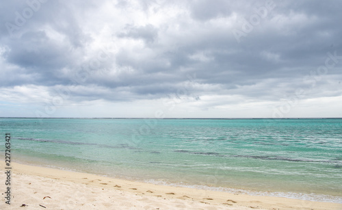 Mauritius beach and sea  waves in the water. Beautiful sea water Indian Ocean. Travel to Mauritius island a paradise island in Africa.