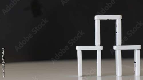 House of dominos falling