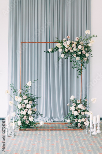 Stylish wedding decor and decoration of the hall. The bride s bouquet and dress  European part. the minimalism and simplicity of the decor