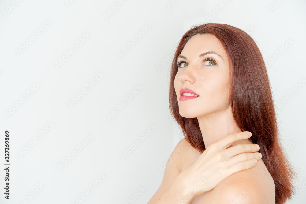 Portrait of beautiful woman poising in studio. Long lash extension and natural nude make up. Woman is thinking. Concept of spa, skincare, wellness White background. Isolated Portrait of beautiful woman poising in studio. Long lash extension and natural nude make up. Woman is thinking. Concept of spa, skincare, wellness White background. Isolated