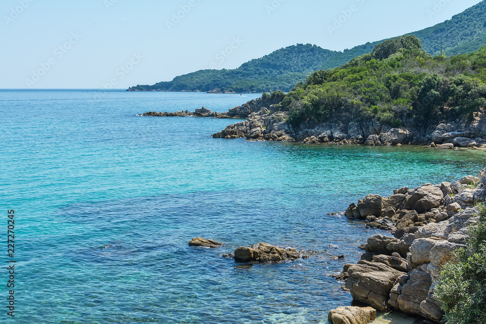 Fototapeta premium Turquoise Seawater surface and beach in Greece
