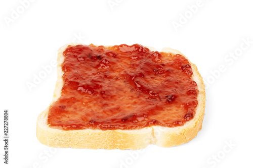 strawberry marmalade on bread slice isolated on white