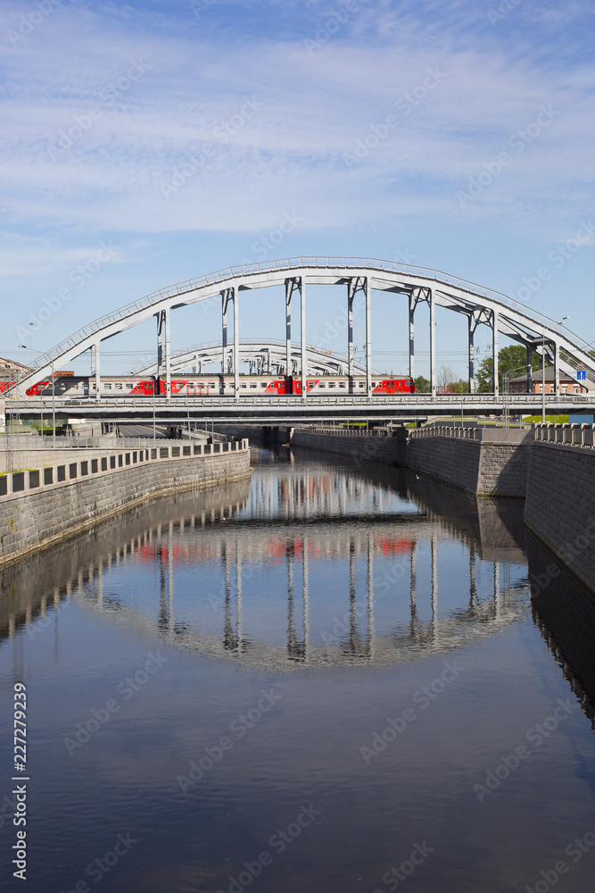 The train travels over the bridge over the river. The train travels over the bridge over the river.