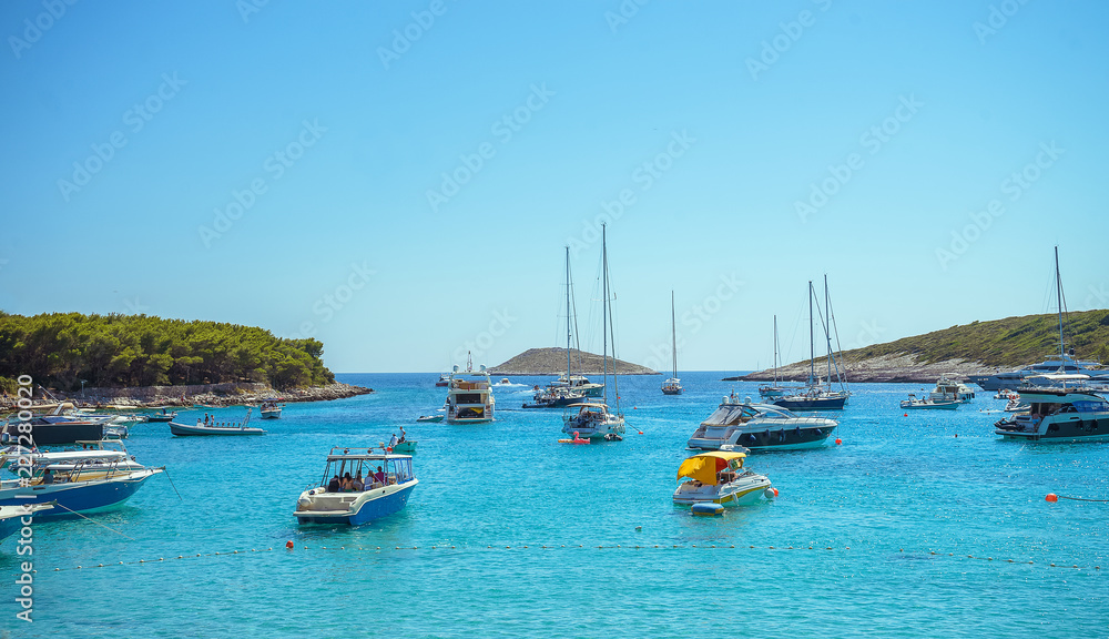 Seascape view to turquoise waters of Adriatic Sea in Island Hvar Croatia. Famous travel sailing destination in Croatia, Island Hvar summer scenery in Europe. Palmizana bay beach
