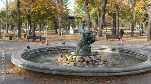 Fountain The Struggle (Borba) or The man with the snake or Fisherman Fountain on Belgrade Kalemegdan Fortress. The bronze sculpture made by sculptor Simeon Roksandic. Belgrade 21 October 2017 photo