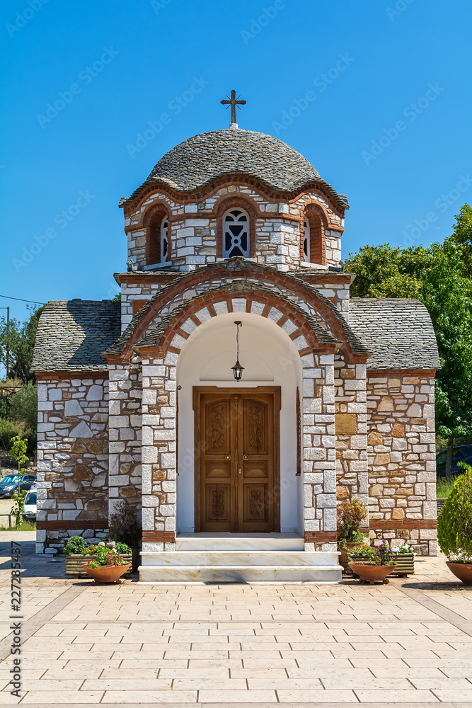 Fototapeta premium Olympiada, Greece - August 18, 2018: St. Nicholas church at the beach of the town Olympiada in Chalkidiki in Greece