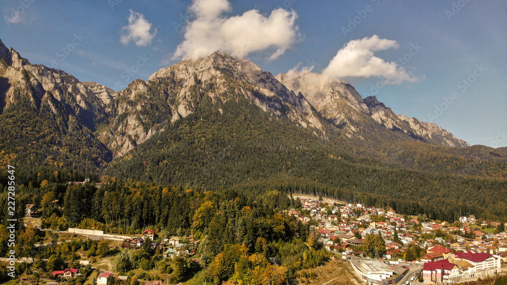 Aerial view of of Cantacuzino castle in Busteni ski resort, Prahova valley. Bucegi mountain, part of Carpathian mountains. Brasov region in Transilvania, Romania. 