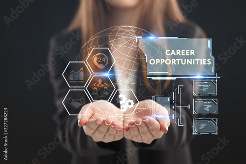 The concept of business, technology, the Internet and the network. A young entrepreneur working on a virtual screen of the future and sees the inscription: Career opportunities