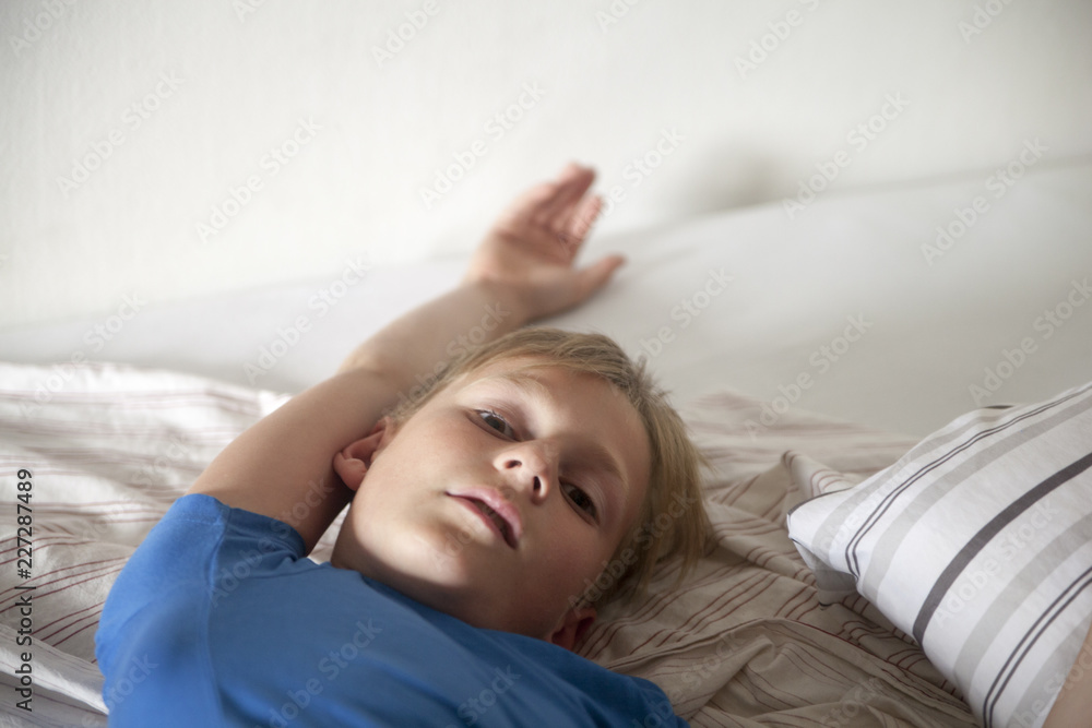 Boy on a bed Boy on a bed