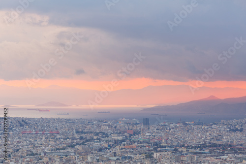 View of Athens and Piraeus from Lycabettus hill at sunset, Greece. 