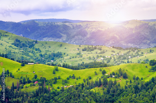 hills mountain slope of the Carpathians, beautiful scenery. houses of the village of Ukraine