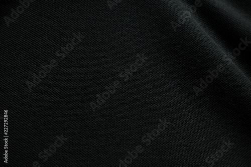 Black rough fabric texture background.