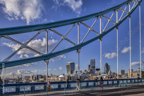London skyline with the Walkie Talkie, the Cheese Grater and the Gherkin, seen through the superstructure of Tower Bridge. photo