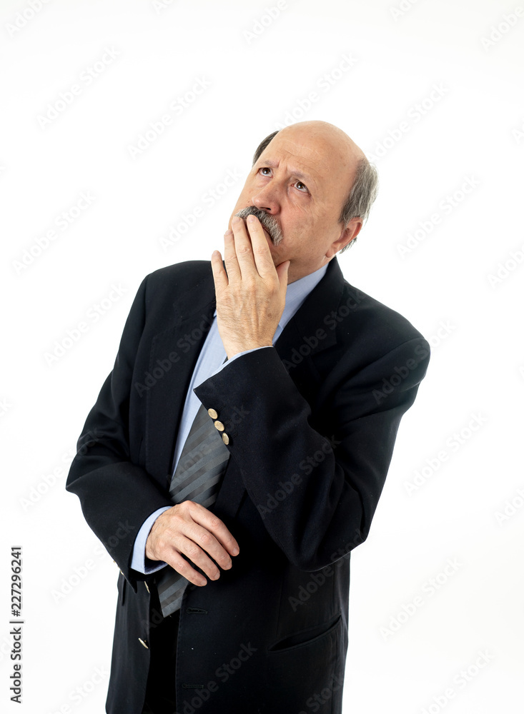 Portrait confident serious concentrated pensive senior businessman thinking and planning Portrait confident serious concentrated pensive senior businessman thinking and planning