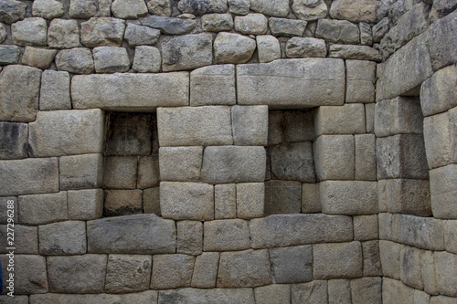 An ancient wall of the inca civilization in Machu Pichuu Cuzco, Peru