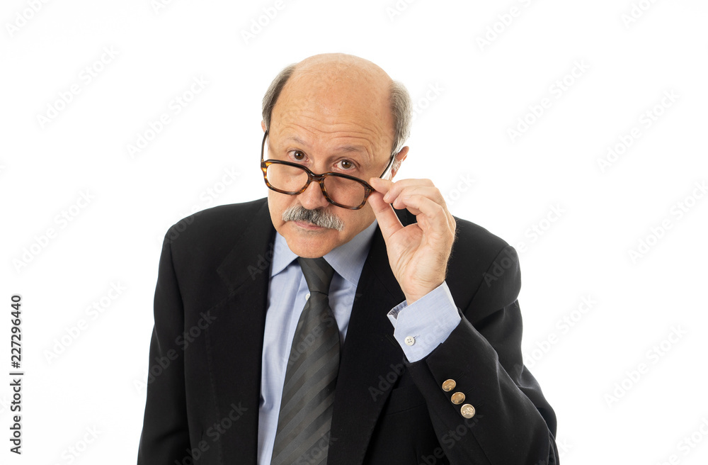 Portrait of senior businessman looking worried and pensive Portrait of senior businessman looking worried and pensive