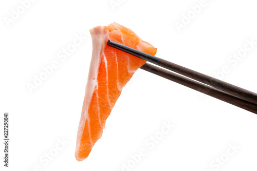 sliced raw salmon in chopsticks isolated on white background, clipping paths