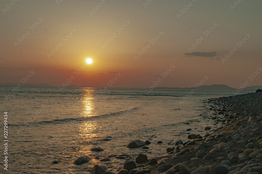 sunset on the sea coast