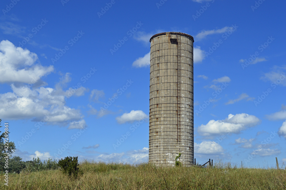 old grain silo and blue sky