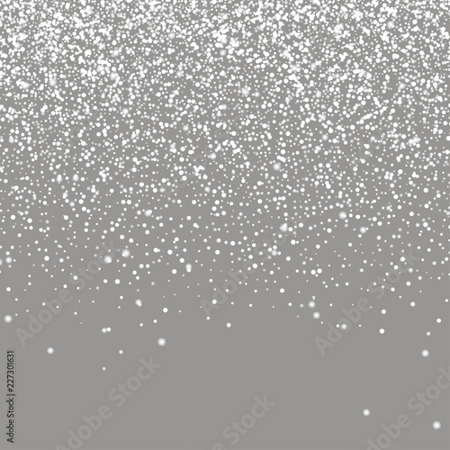 Falling snow on gray background. Realistic falling snowflakes. Christmas and New Year design