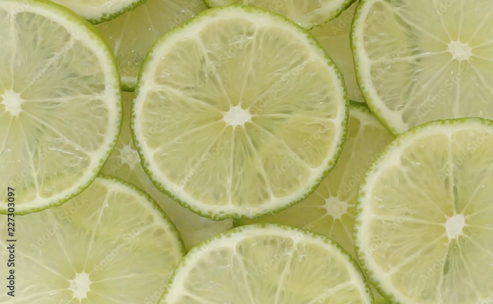 fresh lime slices closeup texture background. Lime Cream pantone color 2025 fresh lime slices closeup texture background. Lime Cream pantone color 2025