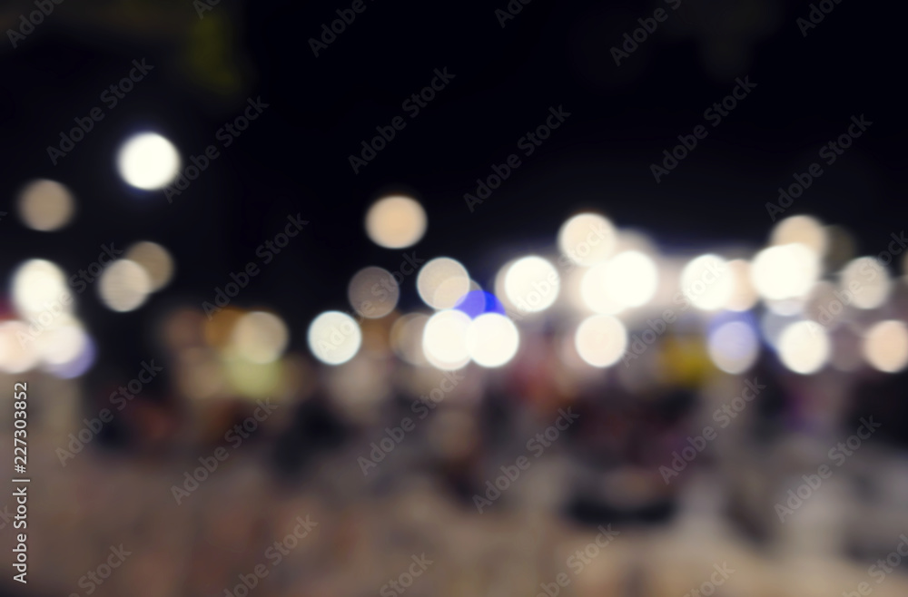 defocused bokeh light, abstract background at night photo