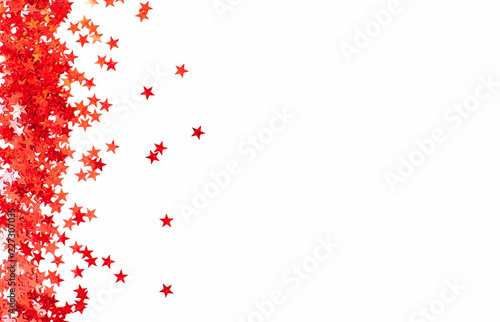 small red stars scattered on a white background