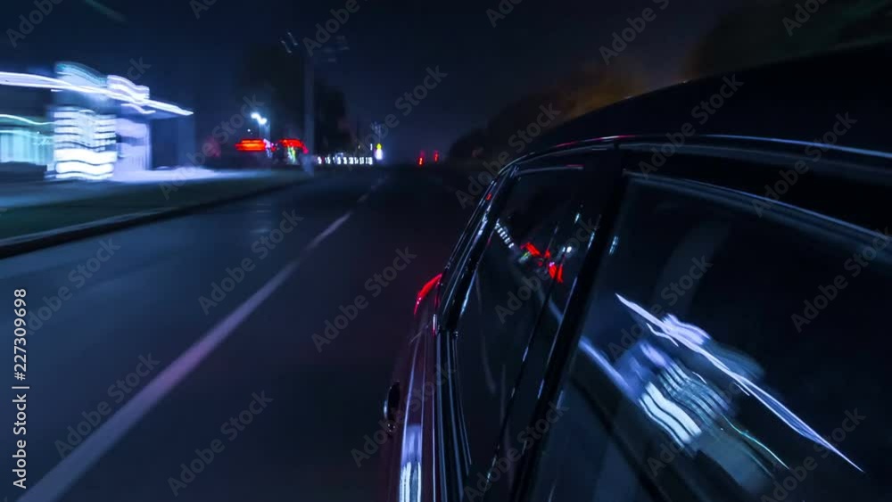 Drivelapse urban look from fast driving car at a night avenue in a city timelapse hyperlapse Drivelapse urban look from fast driving car at a night avenue in a city timelapse hyperlapse