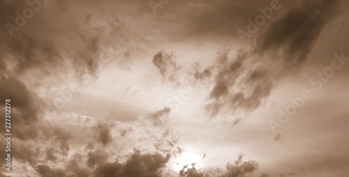 Dramatic clouds with sepia filter