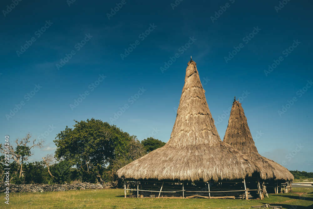 Straw roof hut, traditional Sumba village. Indonesia. The authentic Sumbanese houses Straw roof hut, traditional Sumba village. Indonesia. The authentic Sumbanese houses