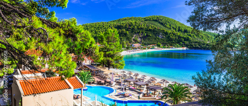 Greek holidays - beautiful Panormos bay. view with hotel and beach. Skopelos island