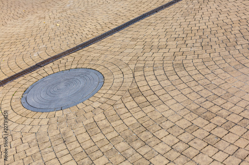 Gray circular paving slab with a beautiful high-quality texture