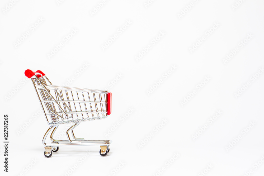 Basic style of shpping cart close up on white background.  Copy space on left side for text or other use.