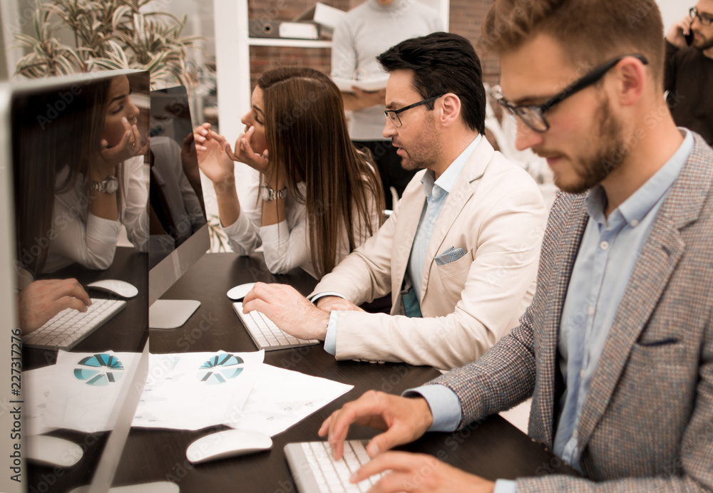Fototapeta premium young businessman typing on the computer keyboard.