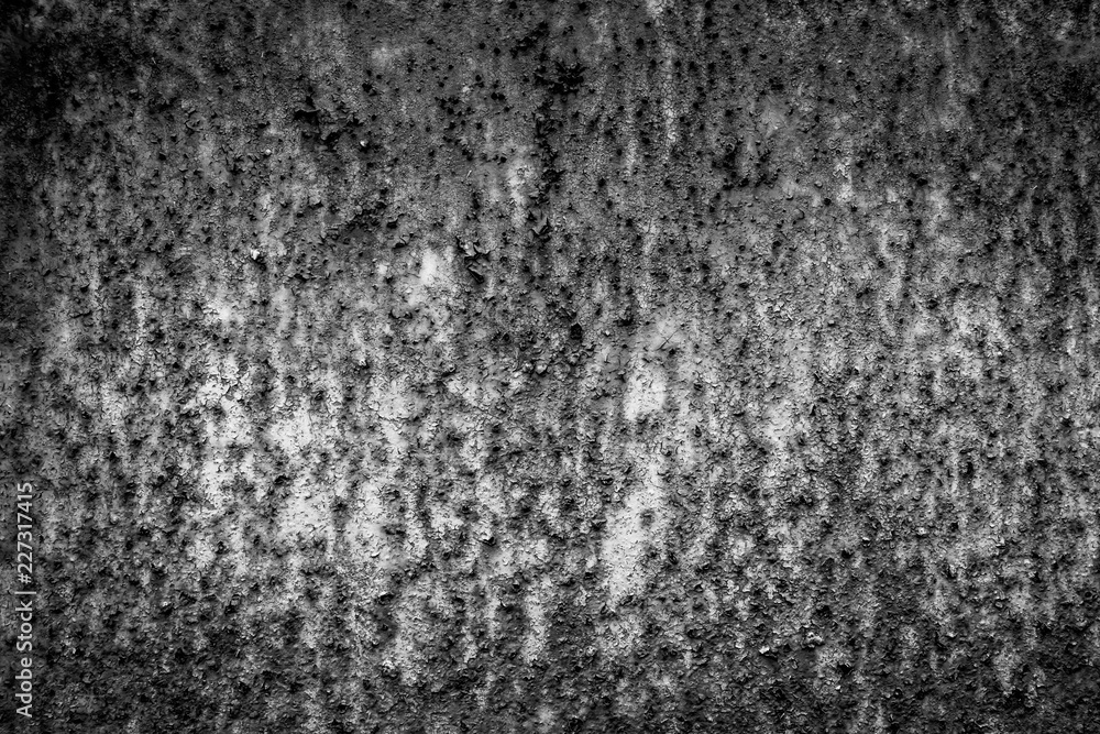 Background of the rusty metal plate on the ship close up.  Processed in Black and white color tone.