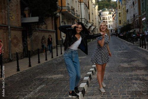 Lesbian couple walking in the city. Being happy together. Samesex love concept. © Svyatoslav Lypynskyy