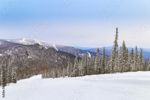 View on top of Mount Utuya. Winter landscape in Altay Mountains. Siberia  Kemerovo region  Sheregesh ski resort  sector E. March 2018.