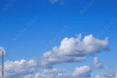 Clouds against blue sky. Blue sky and white clouds. © Iryna 