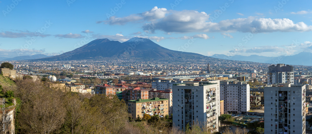 Cityscape of Naples, view of the modern part of the city and Mount Vesuvius on bacground