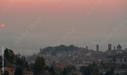 Bergamo. One of the beautiful city in Italy. Morning landscape at the old town from Saint Vigilio hill during fall season © Matteo Ceruti