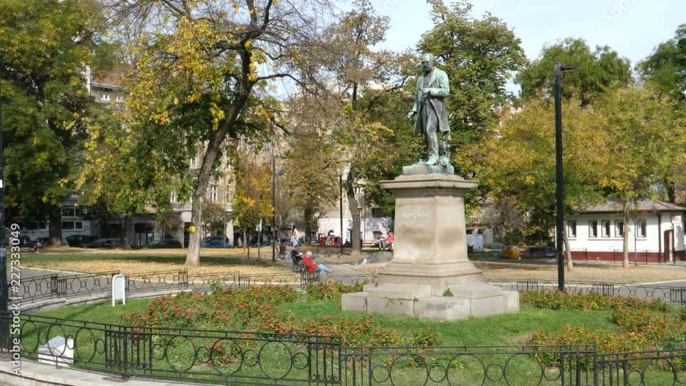 People at Studentski Park (Academic Park) famous park in Studentski Trg (Students Square). Built in 1927 on the place of Grand Market by architect Kovalevski. Belgrade 21 October 2017 People at Studentski Park (Academic Park) famous park in Studentski Trg (Students Square). Built in 1927 on the place of Grand Market by architect Kovalevski. Belgrade 21 October 2017