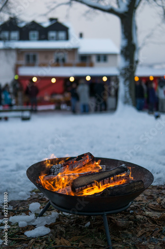 Fire bowl in the winter at a christmas market, Germany. photo