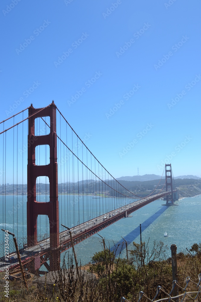 Fototapeta premium san francisco, usa, sea, blue sky, california, golden gate bridge, road way.
