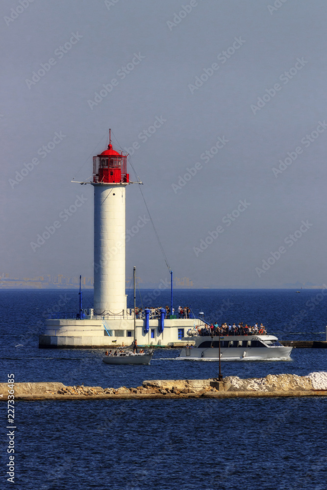 Lighthouse against the blue sky