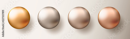 Four realistic transparent spheres or balls in different shades of metallic gold color on white background. Vector illustration eps10