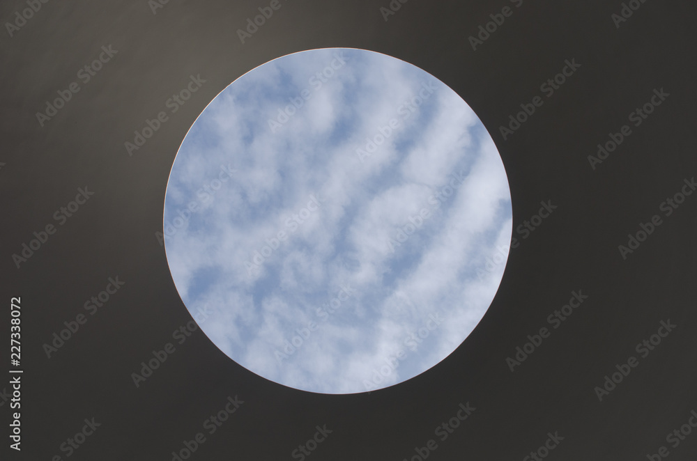 abstract view of clouds through a hole