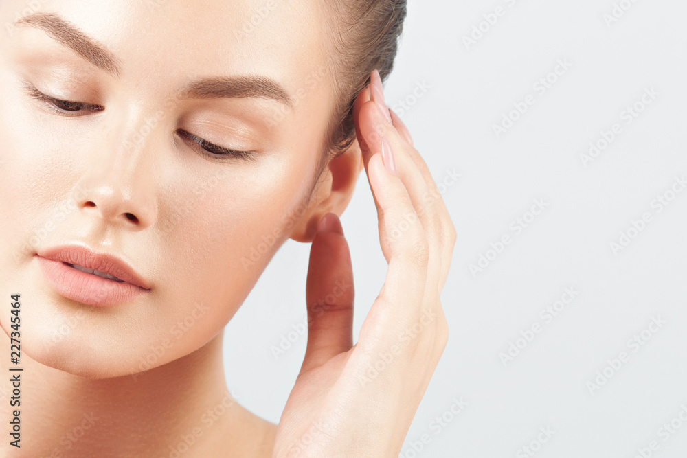 Young beautiful woman with clean perfect skin close-up Young beautiful woman with clean perfect skin close-up
