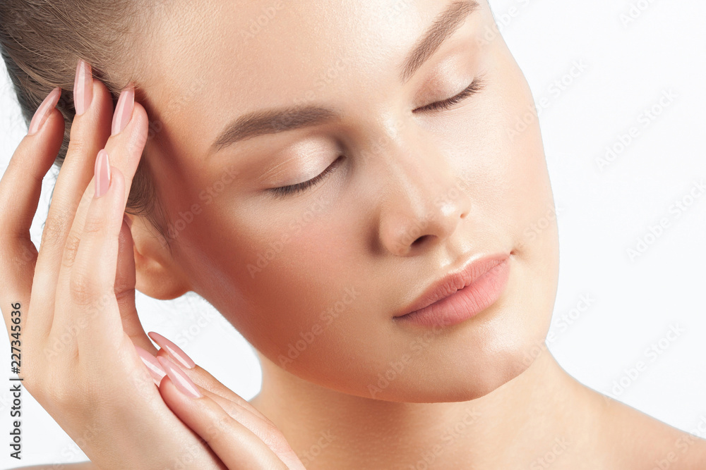 Young beautiful woman with clean perfect skin close-up Young beautiful woman with clean perfect skin close-up